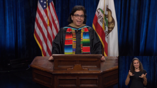 President Diana Rodriguez at podium 
