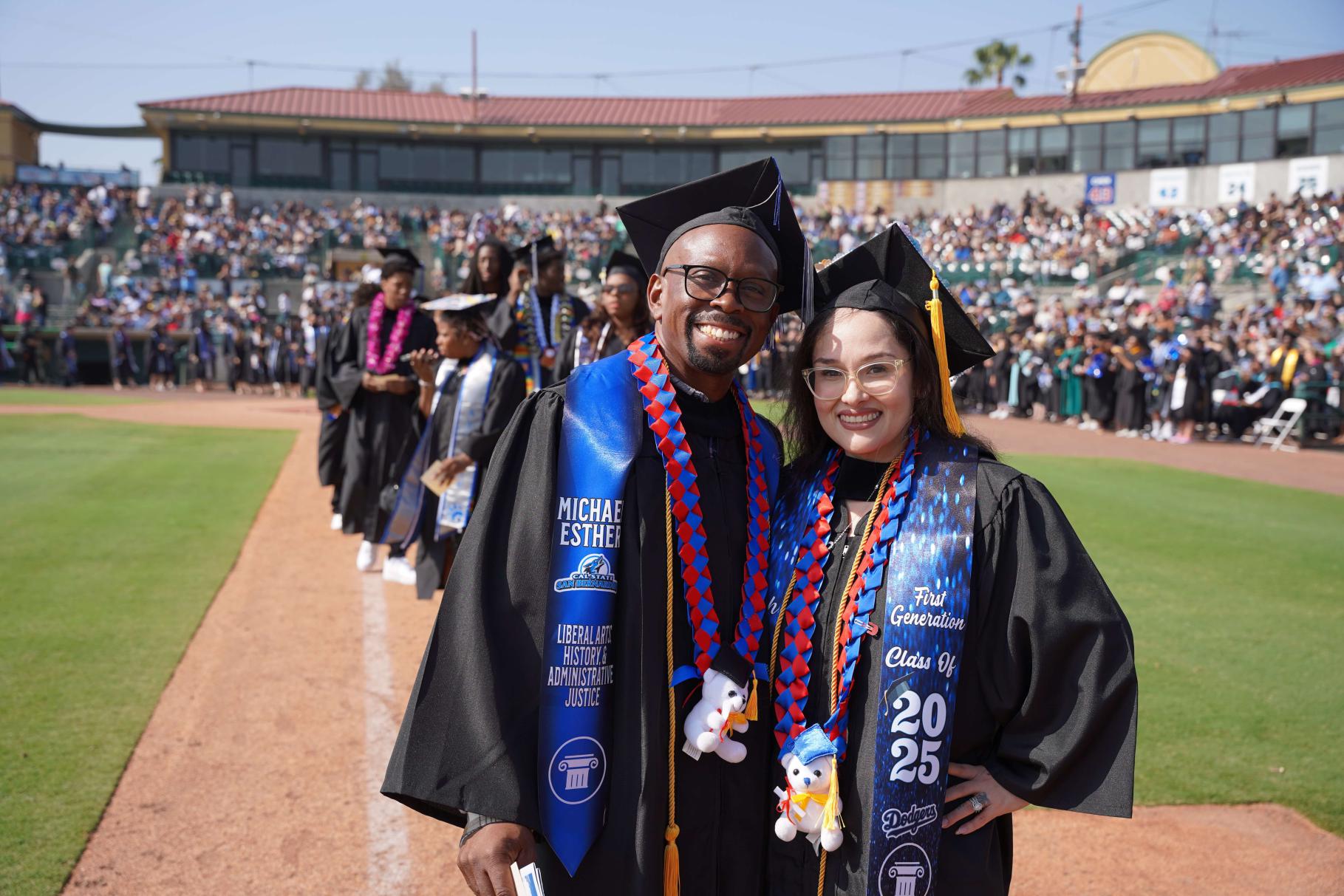 Mitzu and Michael Esther in full graduation attire