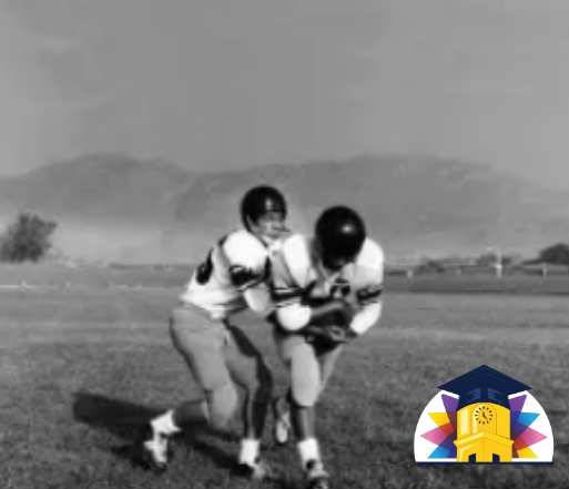 Old photo of Ed Blakely playing football